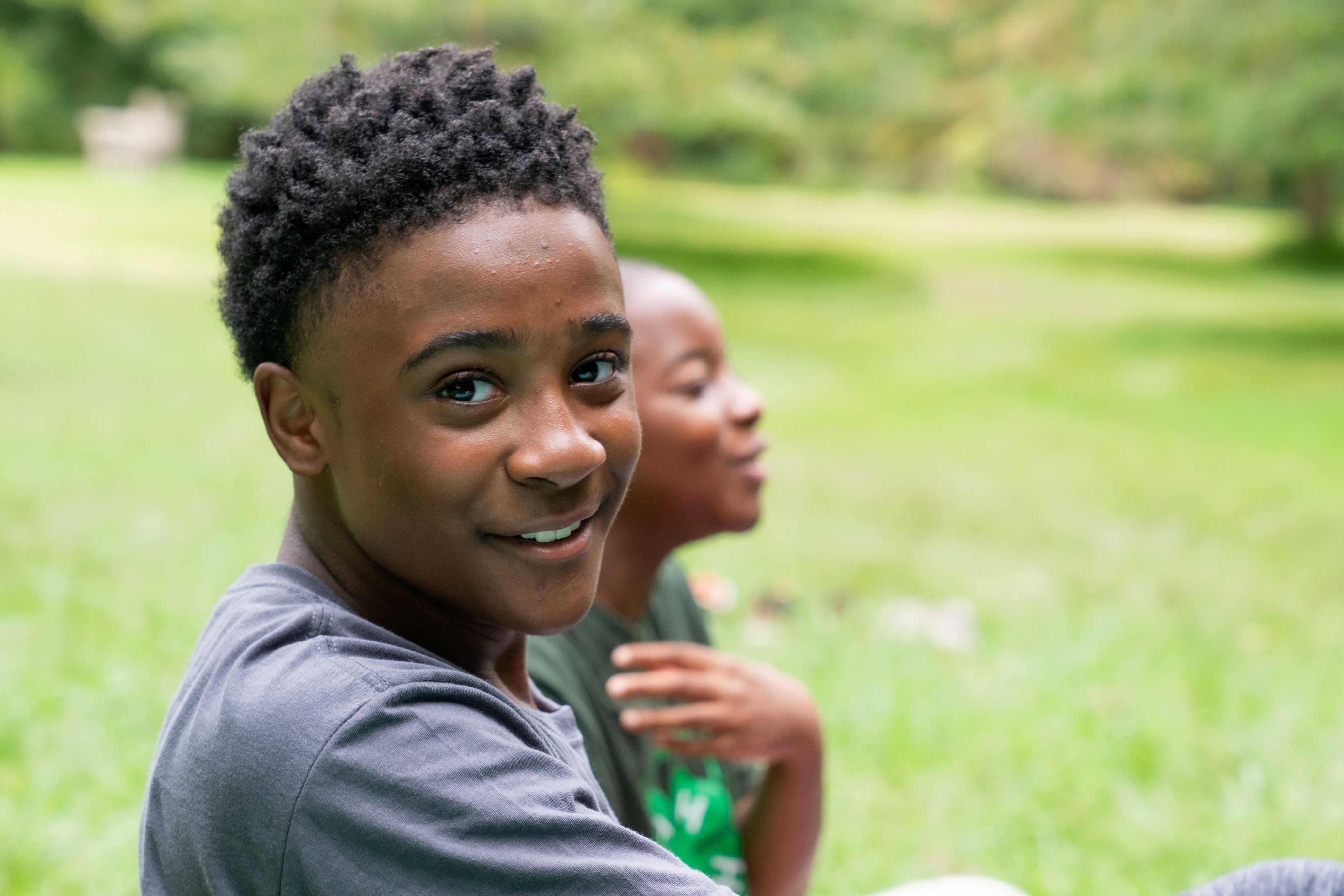Youth Smiling at Camera